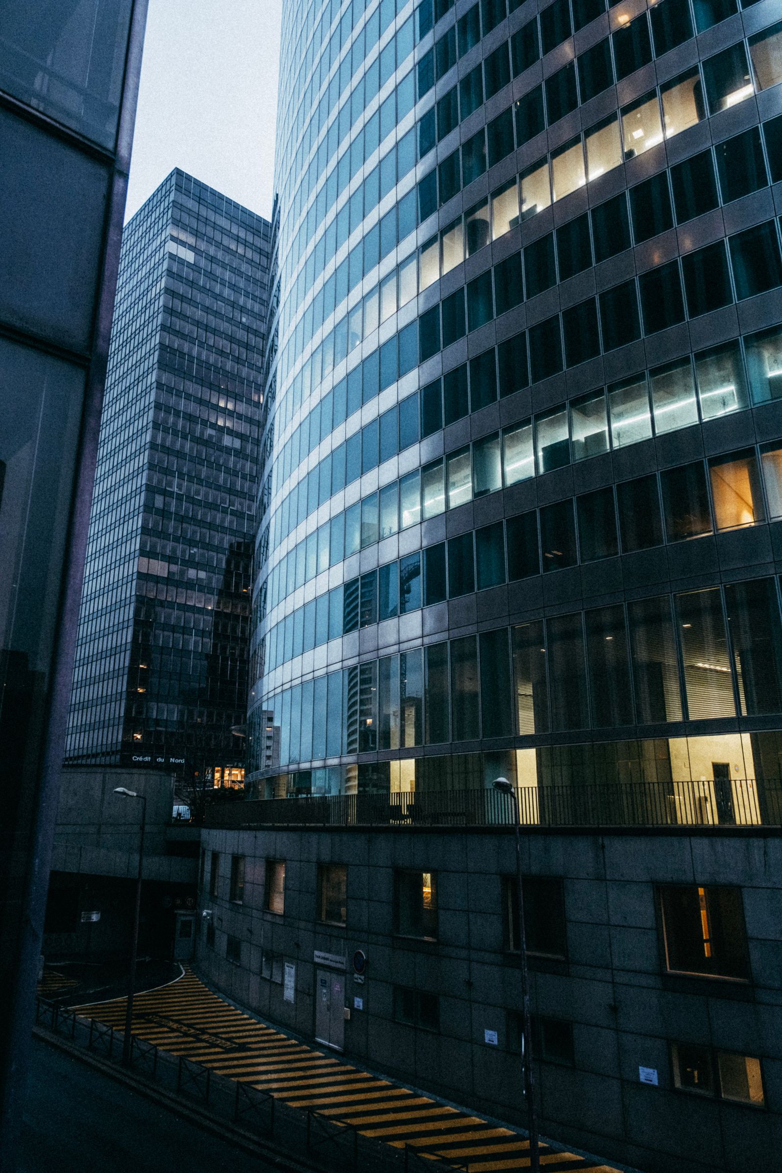 Modern office towers in a city business district at dusk