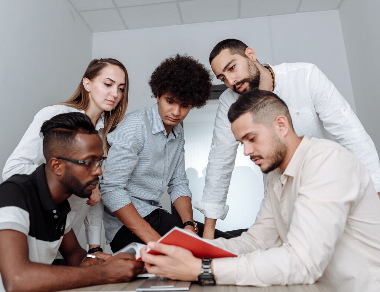A team of partners collaborating in a modern office